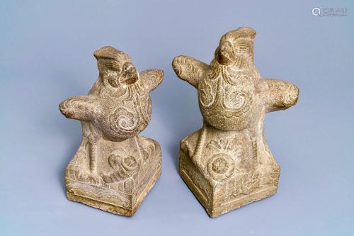 Two large Chinese carved stone 'phoenix' figures, Yuan