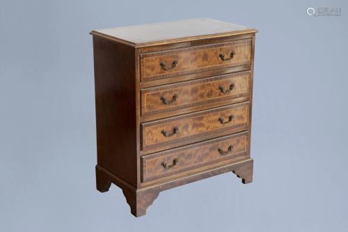 A small English wooden chest with four drawers,