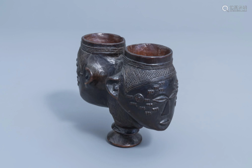 A finely carved Congolese two-headed wooden Lele cup