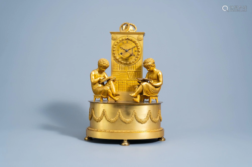 A fine French Empire gilt bronze mantel clock with