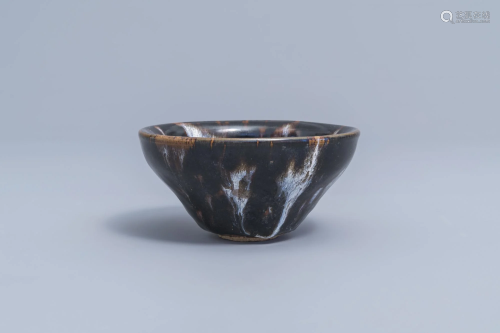 A Chinese black and white splashed Song style bowl,