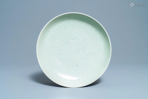A Chinese monochrome celadon glazed charger with