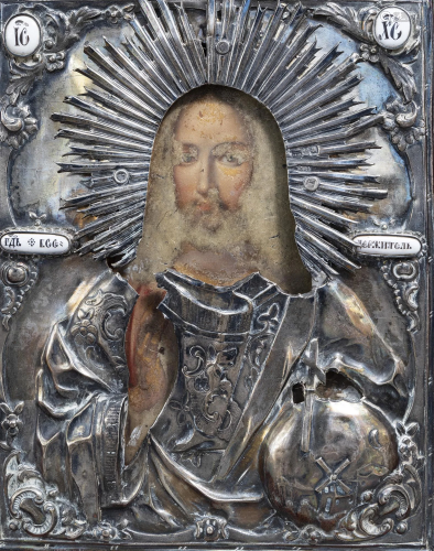 A Russian 'Christ Pantocrator' icon with silver and