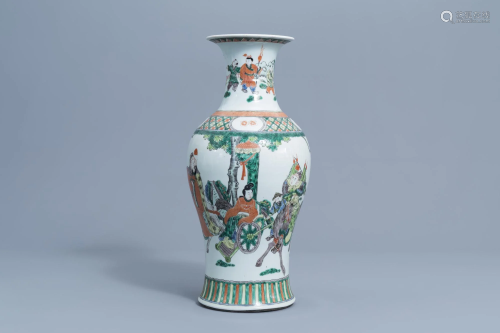 A Chinese famille verte vase with figures in a