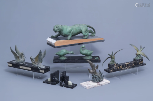 A green patinated metal panther on a marble base, a