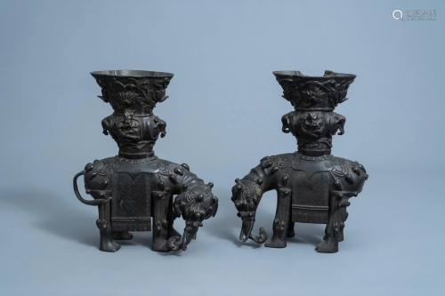A pair of Chinese bronze elephant vases, Kangxi