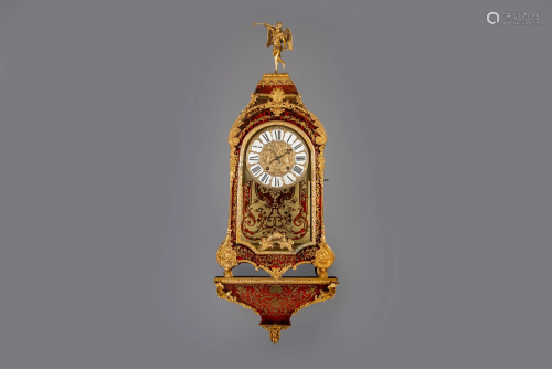A French gilt bronze mounted red tortoiseshell and