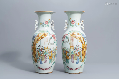 A pair of Chinese famille rose vases with figures on a
