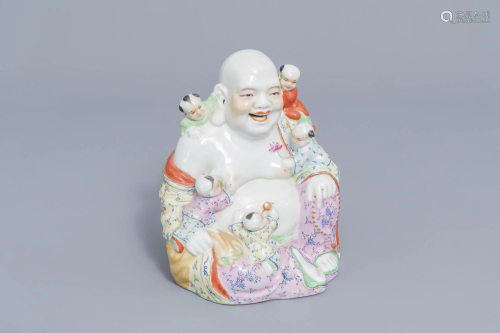 A Chinese famille rose figure of Buddha with children,