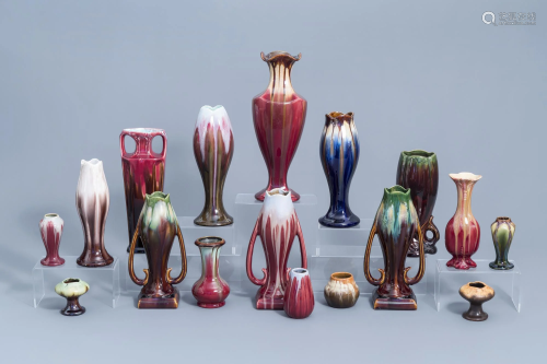 Seventeen polychrome Art Nouveau and Art Deco vases,