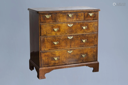An English George I walnut chest with three short and