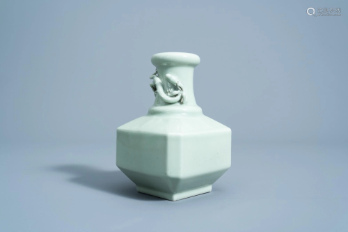 A Chinese monochrome celadon vase with dragon relief
