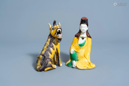 A Chinese sancai glazed figure of Guanyin and a seated