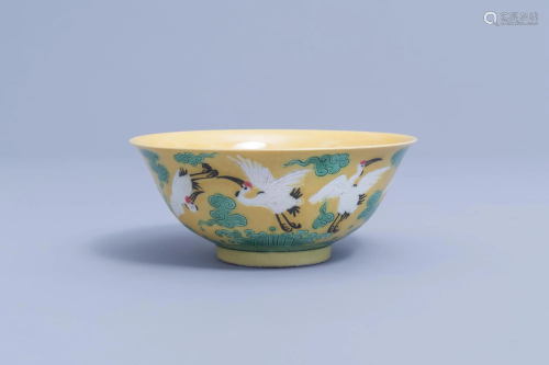 A Chinese yellow ground 'cranes' bowl, Yongzheng mark,