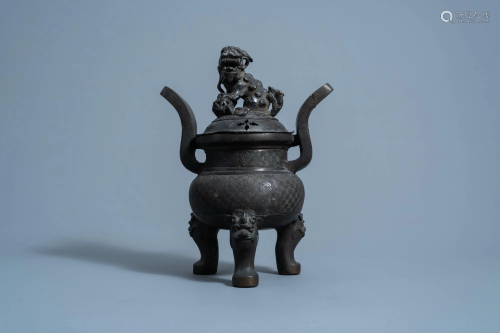 A Chinese bronze tripod censer and cover, Ming