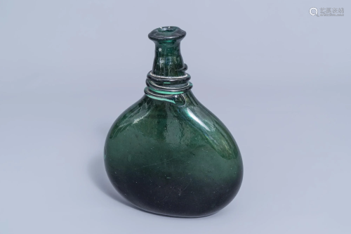 A Persian green glass saddle flask or wine bottle,