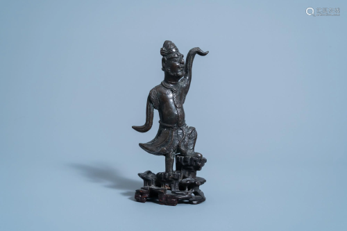 A Chinese bronze figure of a dancer on wooden stand,