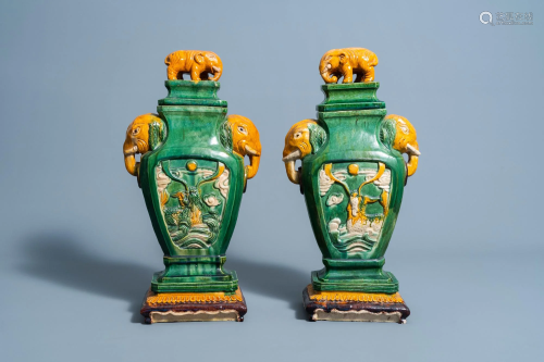 A pair of Chinese sancai glazedv ases and covers with