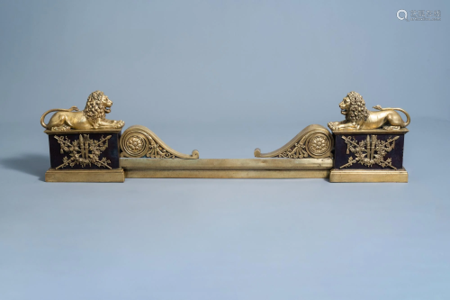 A pair of French Neoclassical patinated and gilt bronze
