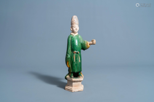 A Chinese sancai glazes figure of a dignitary, Ming or