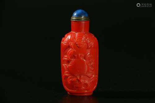 chinese red-ground relief-moulded snuff bottle