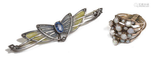 A Continental plique a jour enamel winged brooch, circa 1910