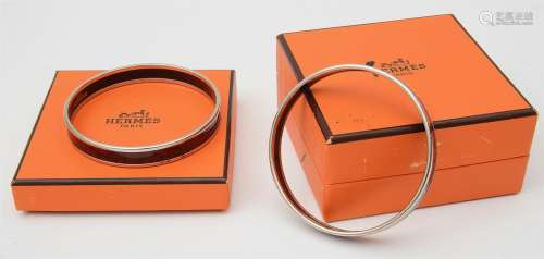 Two Hermes boxed enamel and palladium bangles