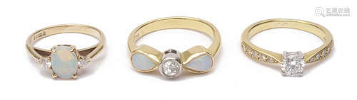 A single stone diamond set ring and two opal and diamond set...