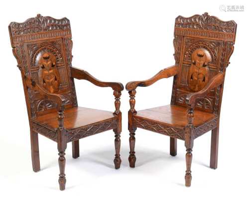Pair of Victorian oak wainscot style armchairs