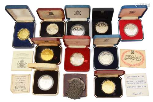 A collection of mostly silver proof crowns and other coins