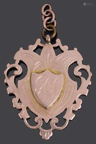 An Edwardian rose gold fob medal
