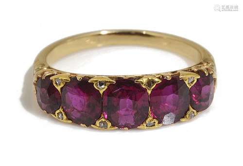 An attractive late Victorian ruby five stone half hoop ring