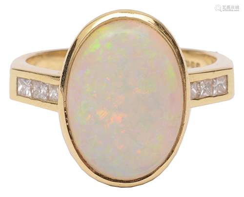 A contemporary opal and diamond set dress ring