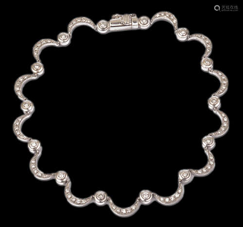 A delicate white gold and diamond set bracelet