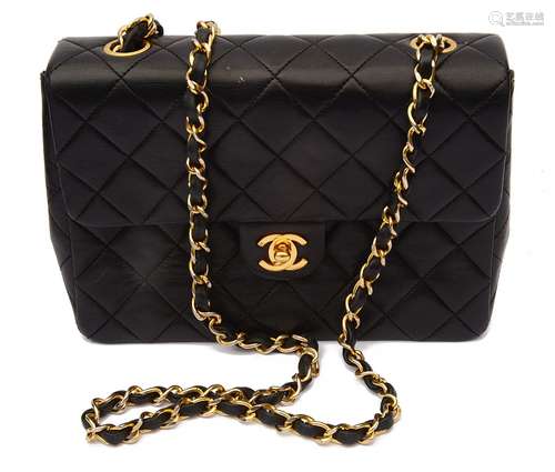 A Chanel black quilted lambskin mini flap 1989 handbag