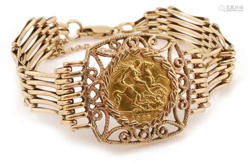 A 9ct gate bracelet with mounted half sovereign