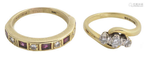 A three stone diamond ring and a diamond and ruby ring