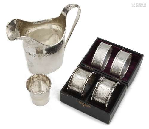 An Edwardian silver helmet shaped cream jug, a cased pair of...