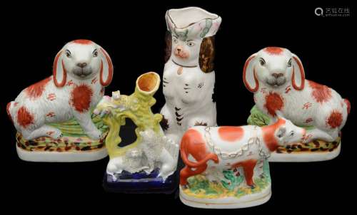 A group of 19th century and later Staffordshire pottery anim...