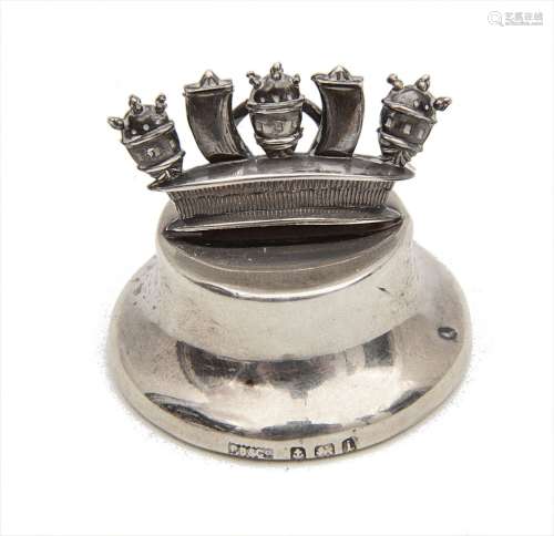 An Edwardian silver menu holder in the form of the Royal Nav...