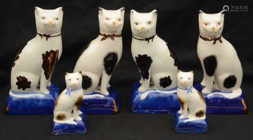 Three pairs of 20th century Staffordshire pottery cats,