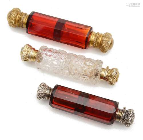 Three Victorian double ended glass scent bottles,