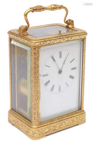 Mid 19th c. Fr. engraved gilt brass case carriage clock by A...