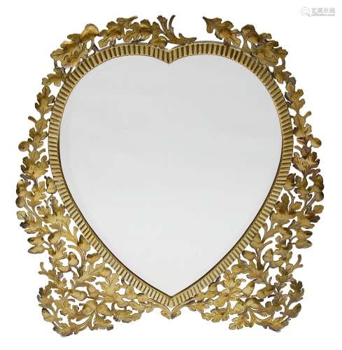 An Edwardian brass heart shaped easel back mirror