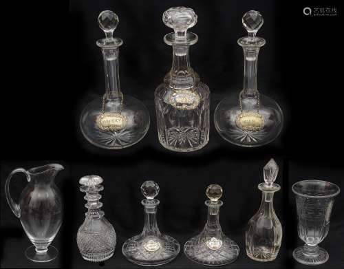 A collection of Victorian and later cut decanters and other ...