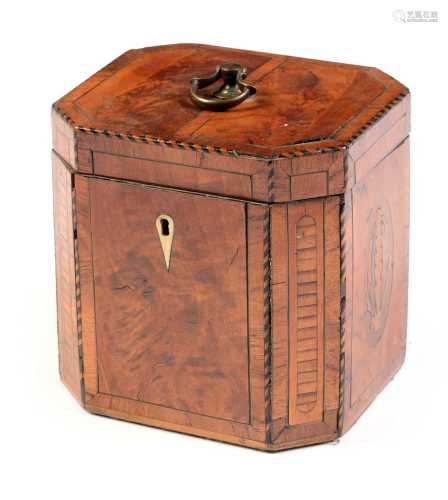 A George III marquetry inlaid flame mahogany tea caddy.