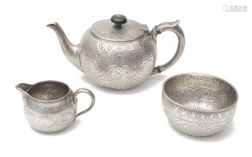 A late Victorian silver three piece bachelors tea service