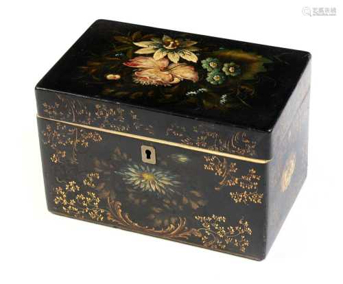 A 19th Century black Japanned and ivory mounted tea caddy.