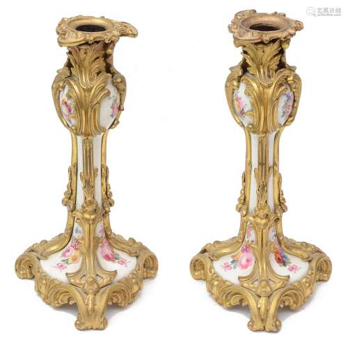 A pair of late 19th c. Fr. ormolu mounted porcelain candlest...