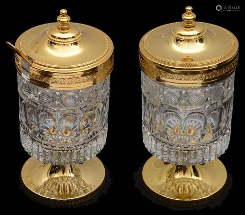 A pair of continental gilt metal and moulded crystal preserv...